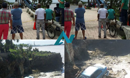 Vehículo se desliza y cae a la arena en malecón