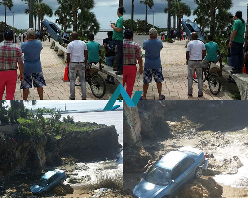 Vehículo se desliza y cae a la arena en malecón